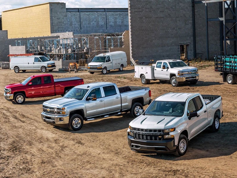 Commercial Silverado 4500 HD, 5500 HD, 6500 HD vehicles on a construction site